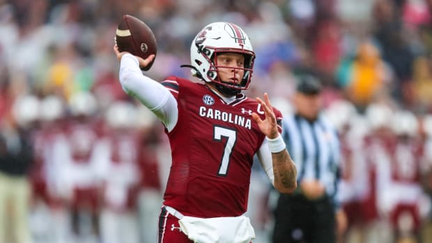 South Carolina Gamecocks quarterback Spencer Rattler (7) throws for a touchdown against the Vanderbilt Commodores in the first quarter at Williams-Brice Stadium.